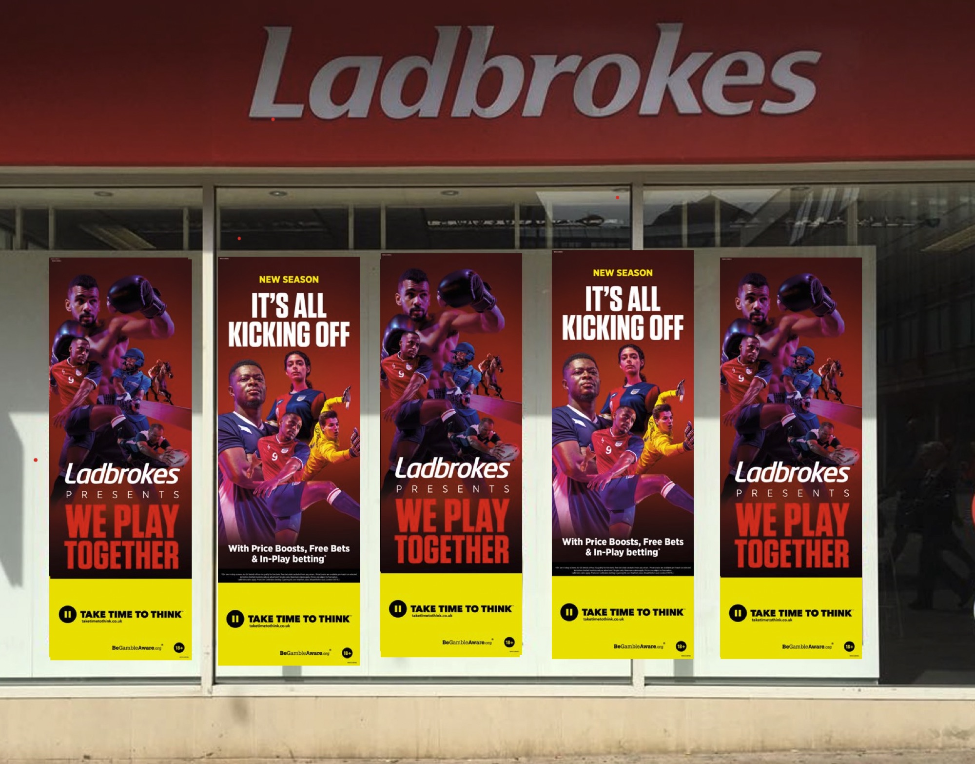Ladbrokes shop windows with “It’s all kicking off” and “We Play Together” posters